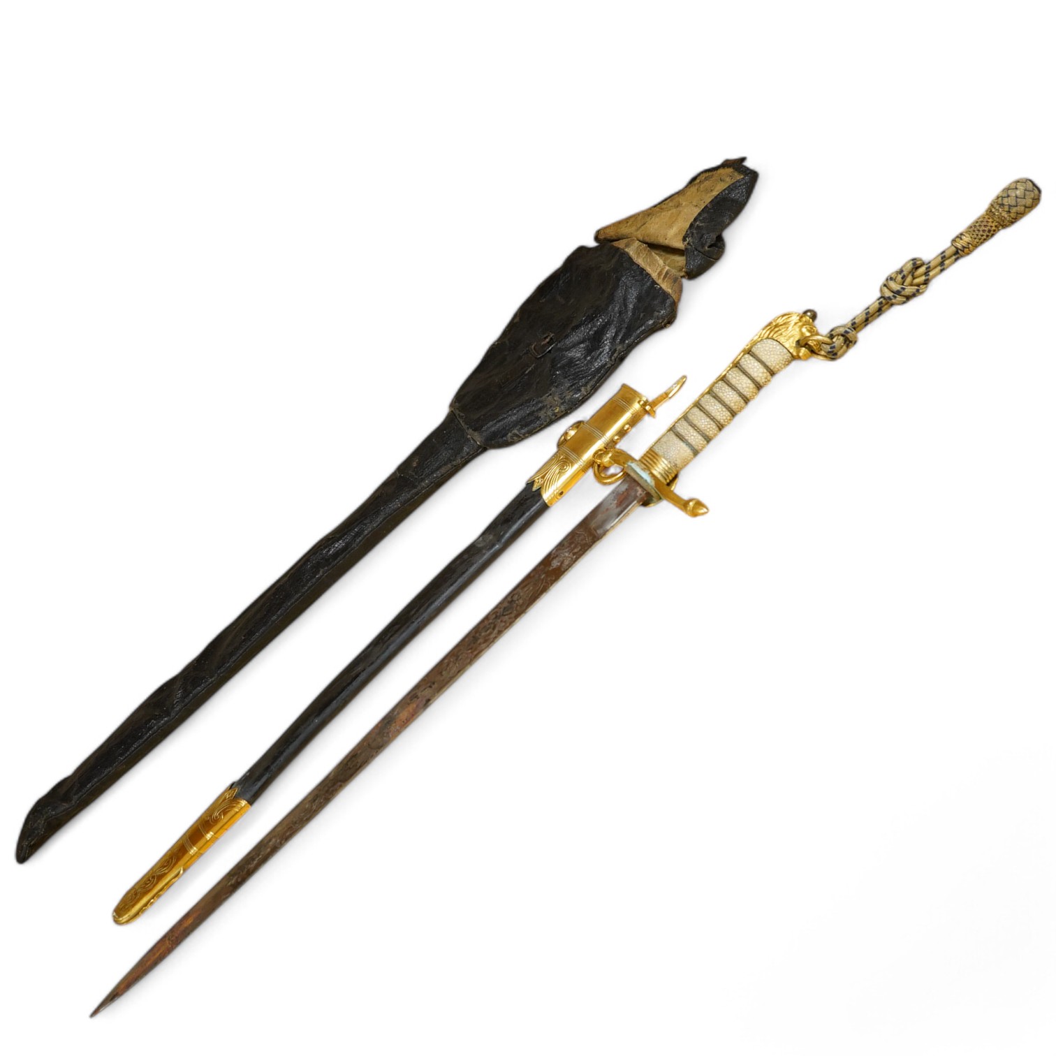 A post 1901 British naval officer’s dirk, the locket engraved with owners initials ‘CHCO’R’, regulation gilt brass mounts, with wire bound fish skin grip, bullion dress knot, in its original scabbard, blade etched with c